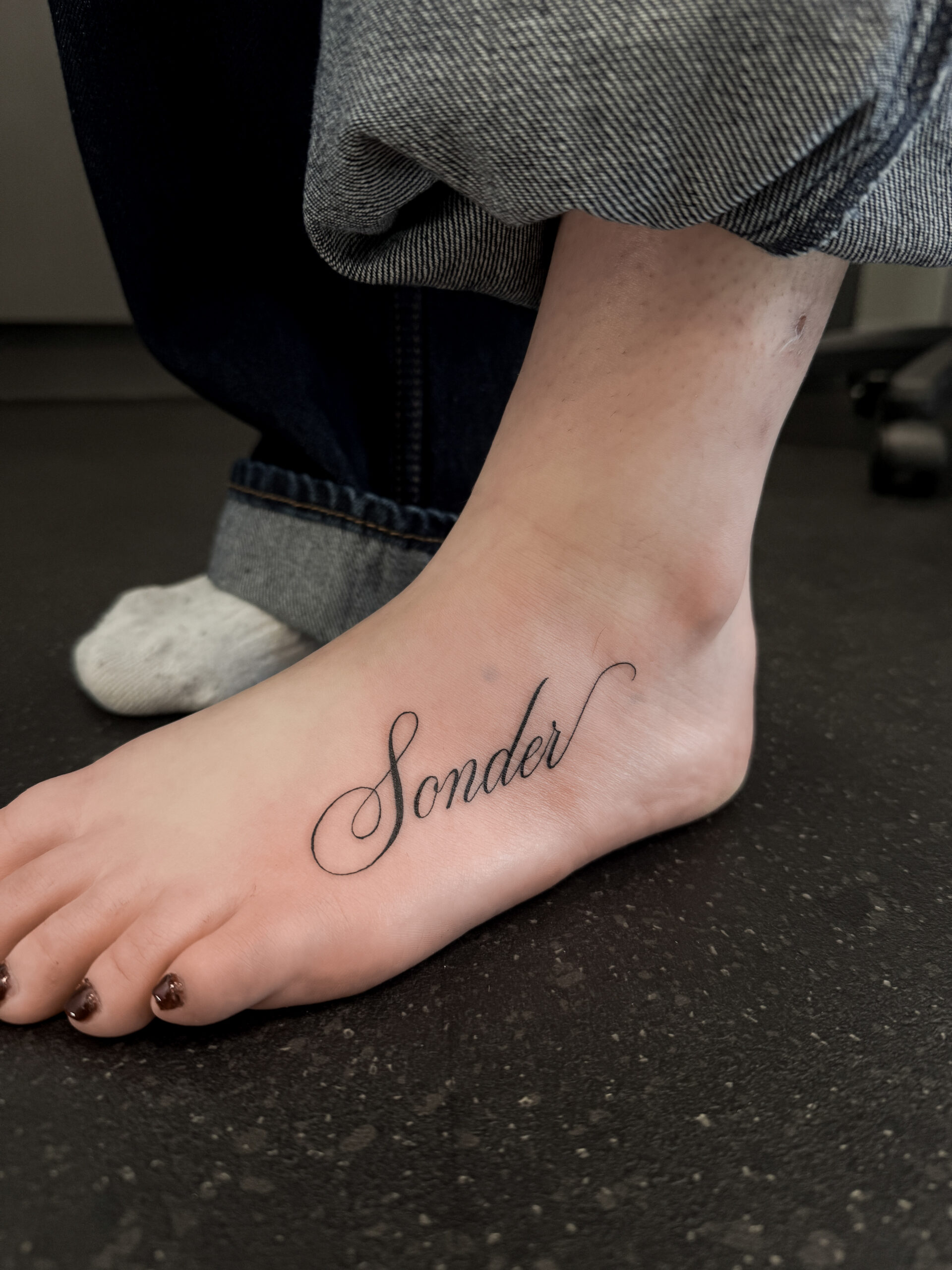 “Sonder” Script Tattoo