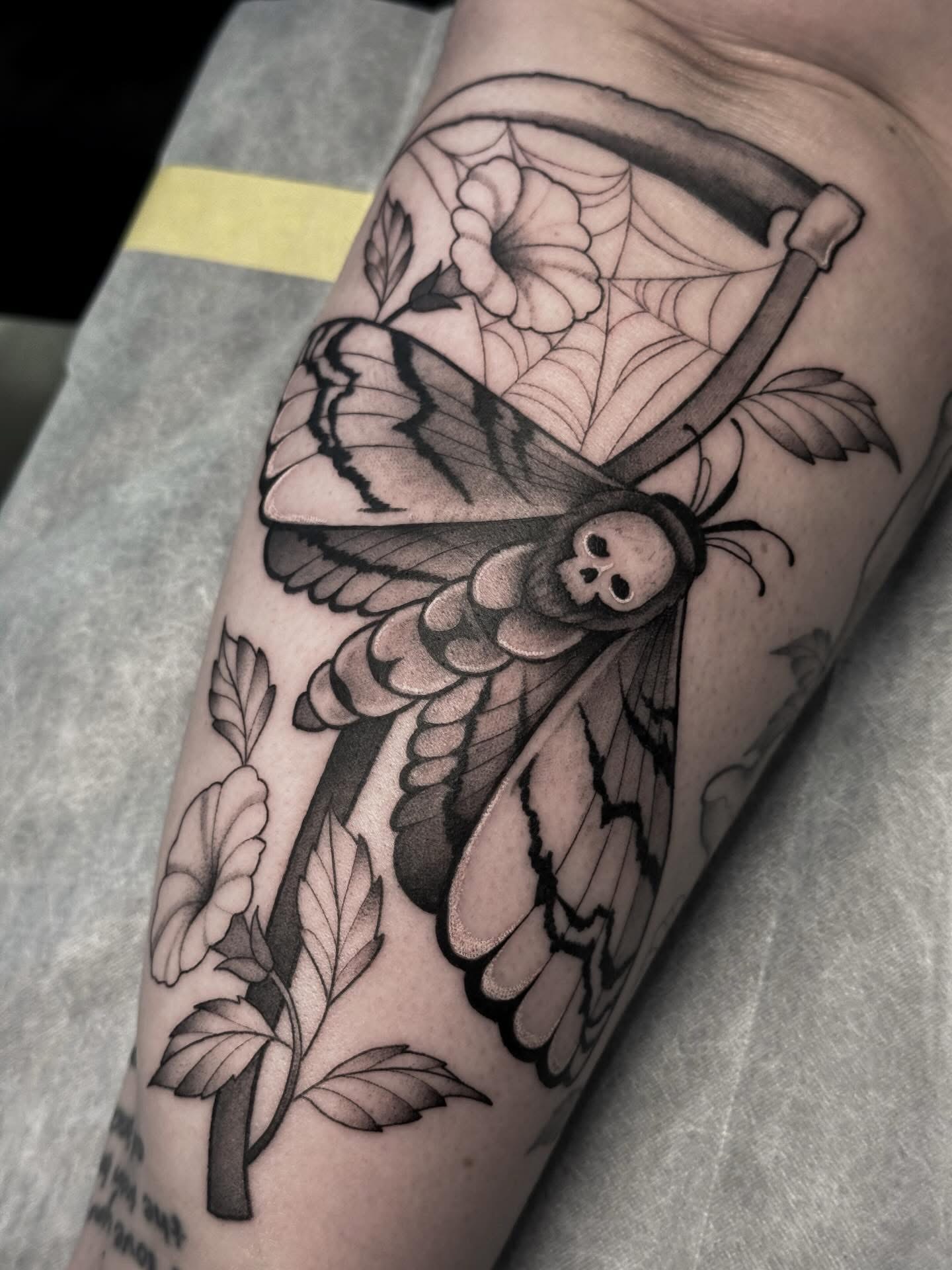 black-and-grey-detath-moth-tattoo-christchurch