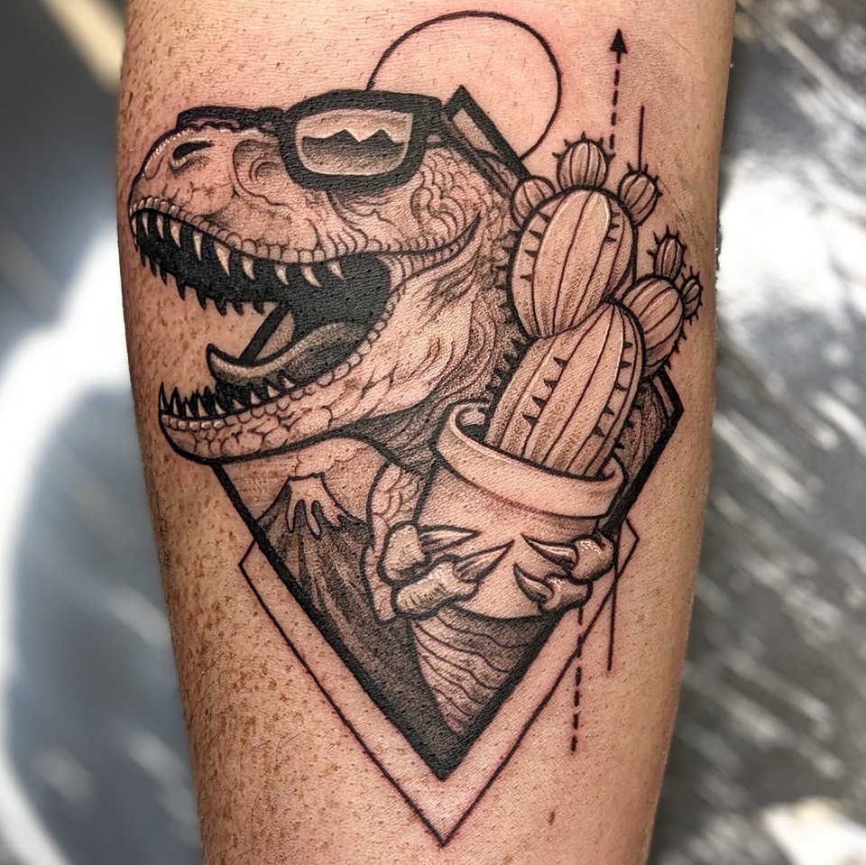 black-and-grey-dinosaur-tattoo-christchurch