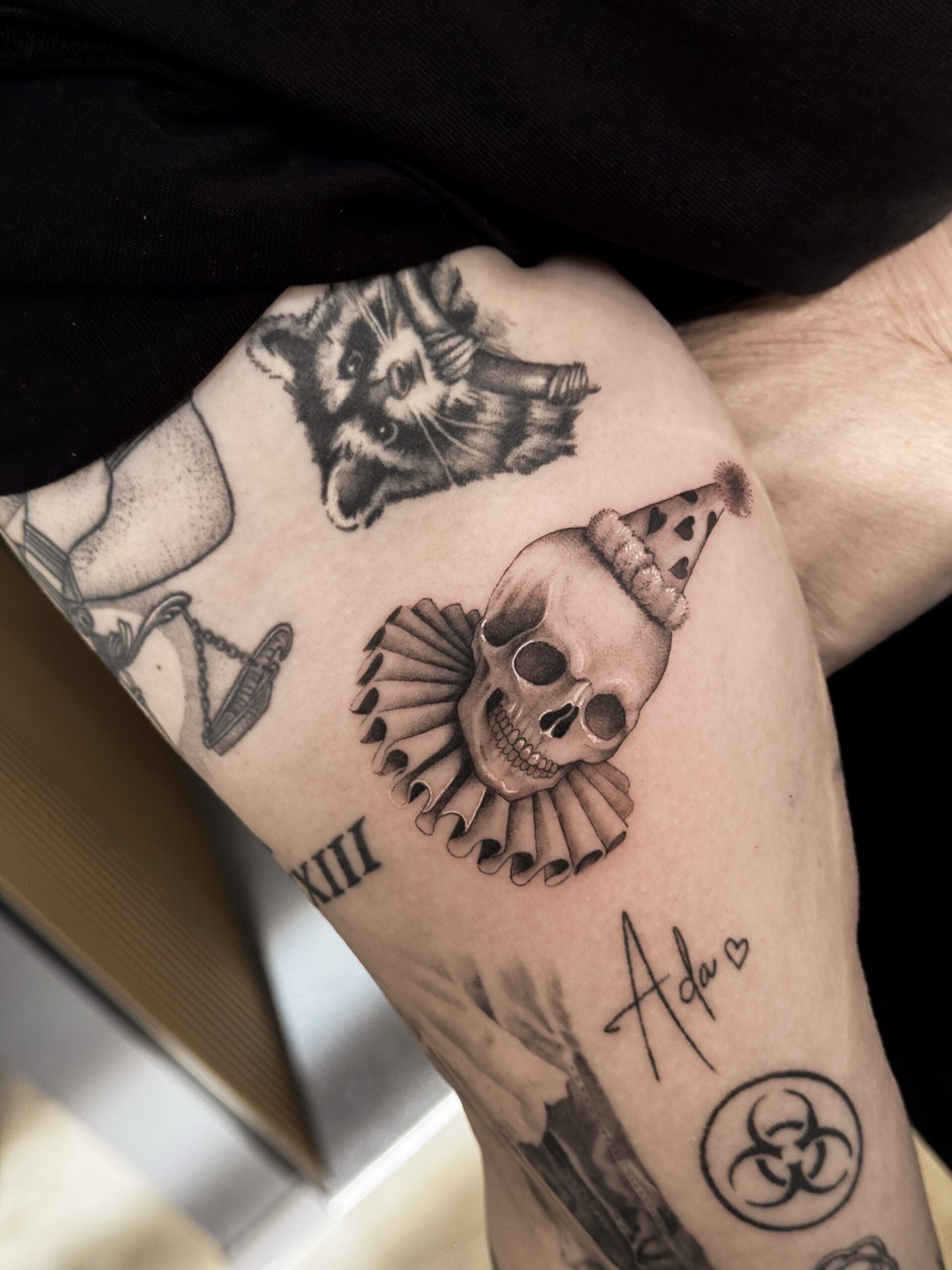 black-and-grey-miniature-clown-skull-tattoo-christchurch