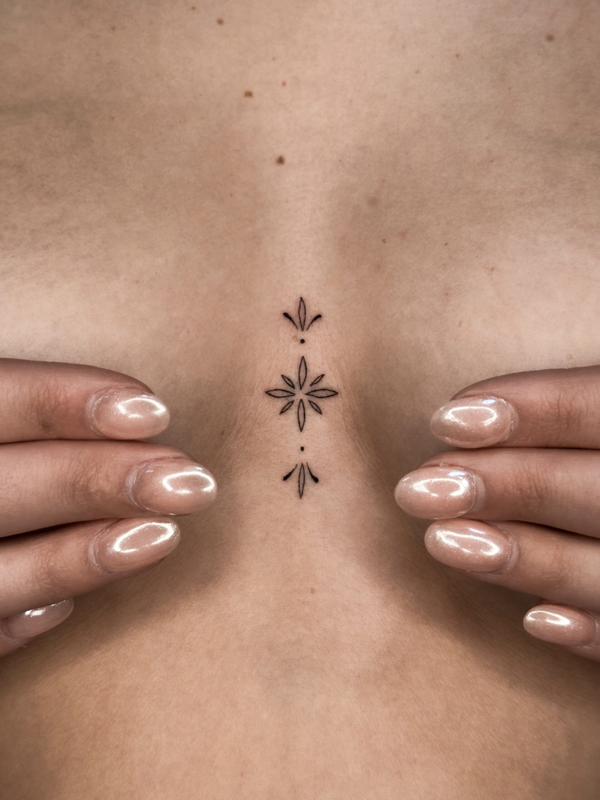 fineline-sternum-tattoo-christchurch