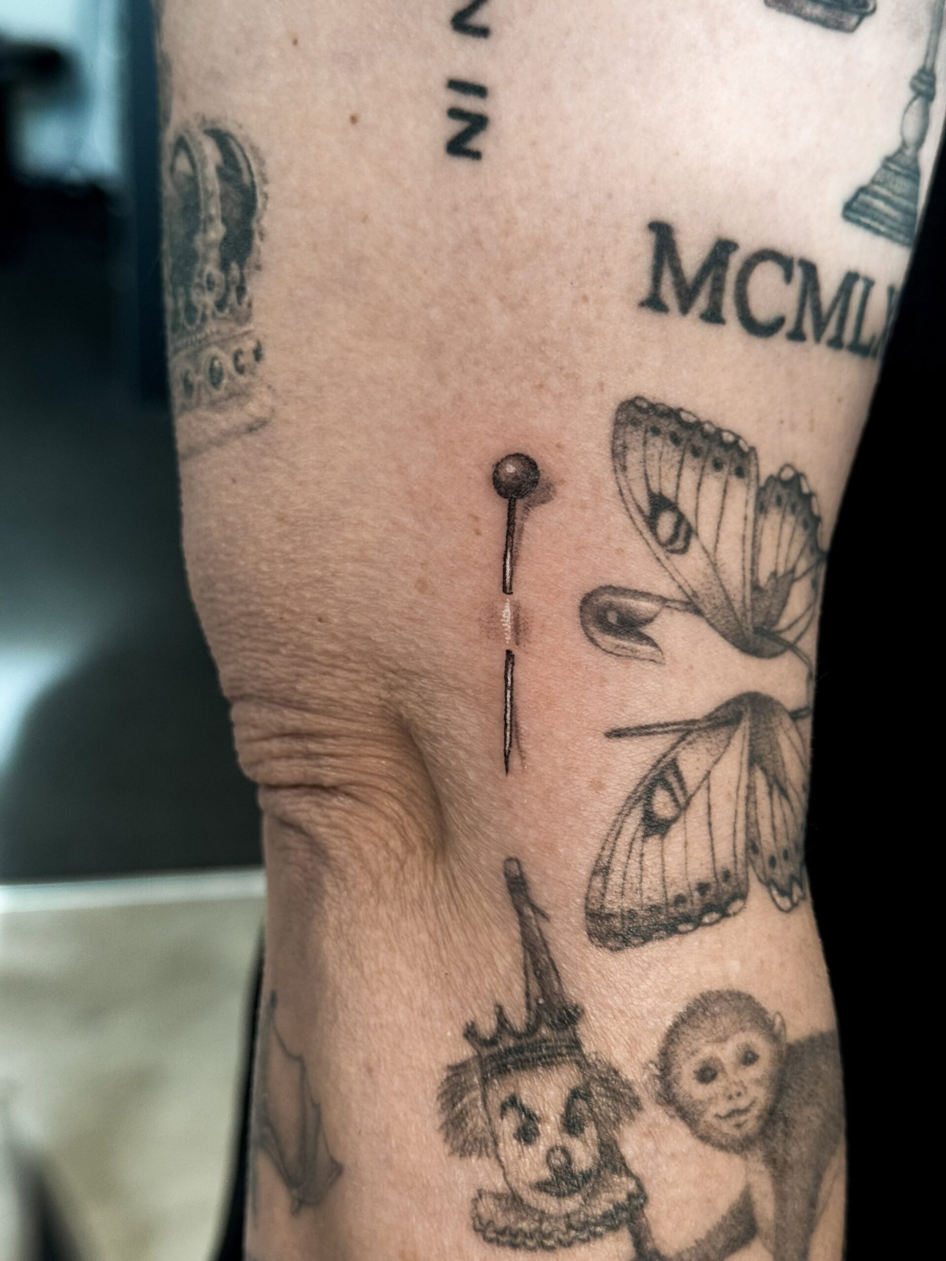 realistic-pin-in-skin-tattoo-christchurch