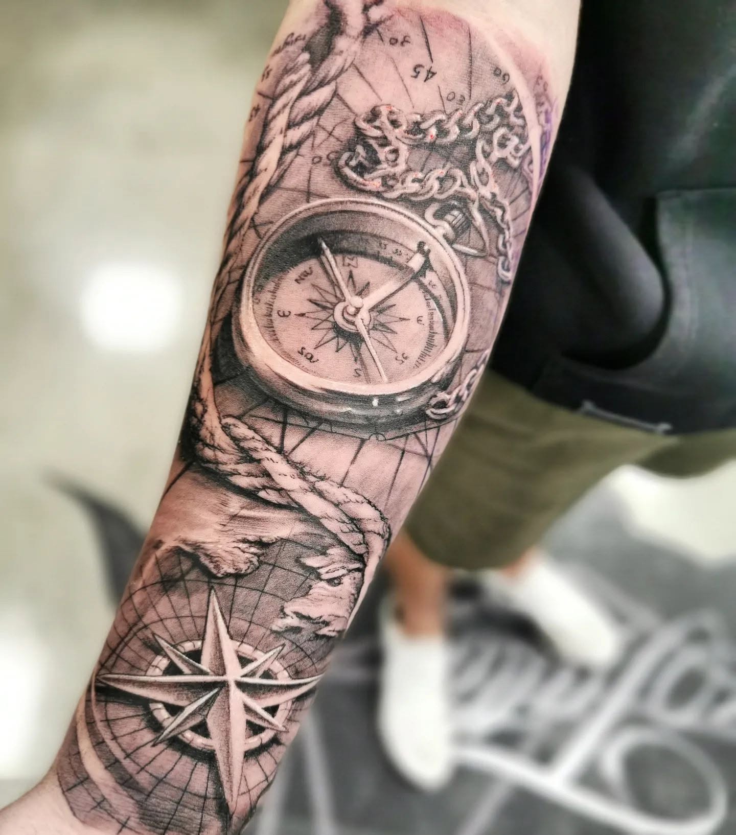 black-and-grey-compass-map-tattoo-christchurch