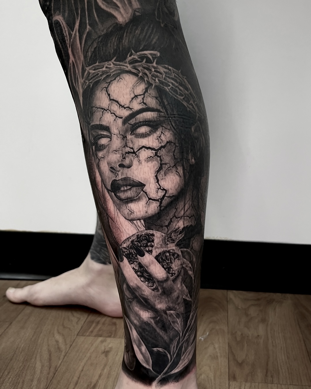 black-and-grey-dark-horror-realism-calf-tattoo-christchurch
