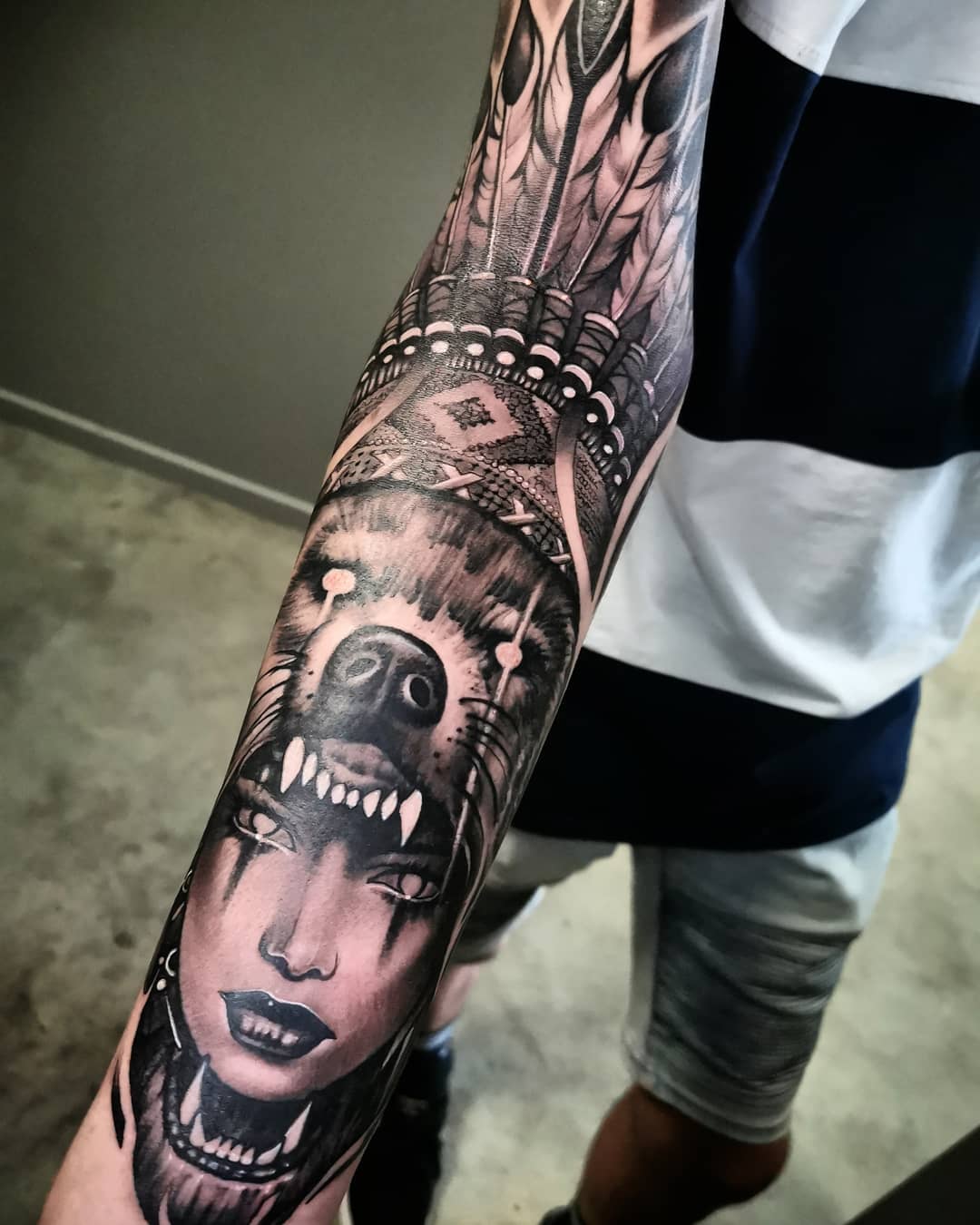 black-and-grey-forearm-indian-headdress-tattoo-christchurch