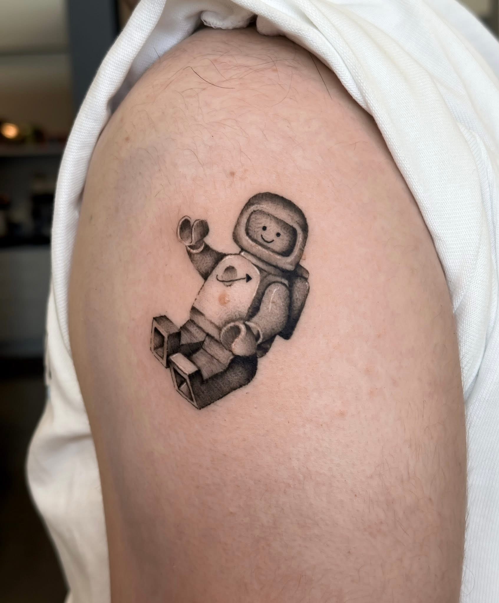 black-and-grey-lego-man-tattoo-christchurch