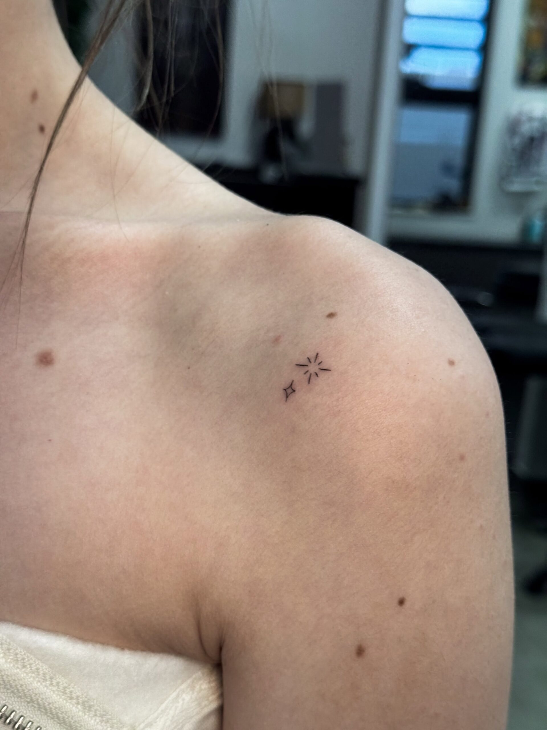 tiny-star-burst-tattoo-christchurch